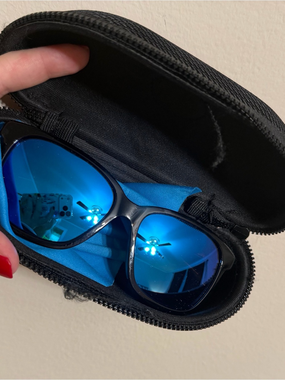 Costa Women's Black Frame Sunglasses with Blue Mirrored Lenses
